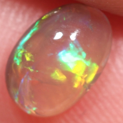 SOLID CRYSTAL OPAL Bright rolling flashes throughout the opal in a 3D pattern